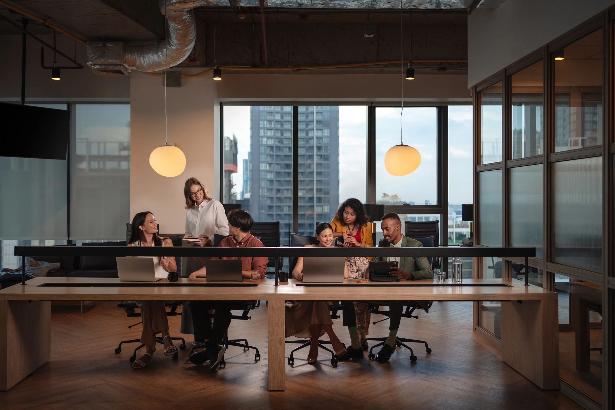 Technology consulting team collaborating in a modern workspace